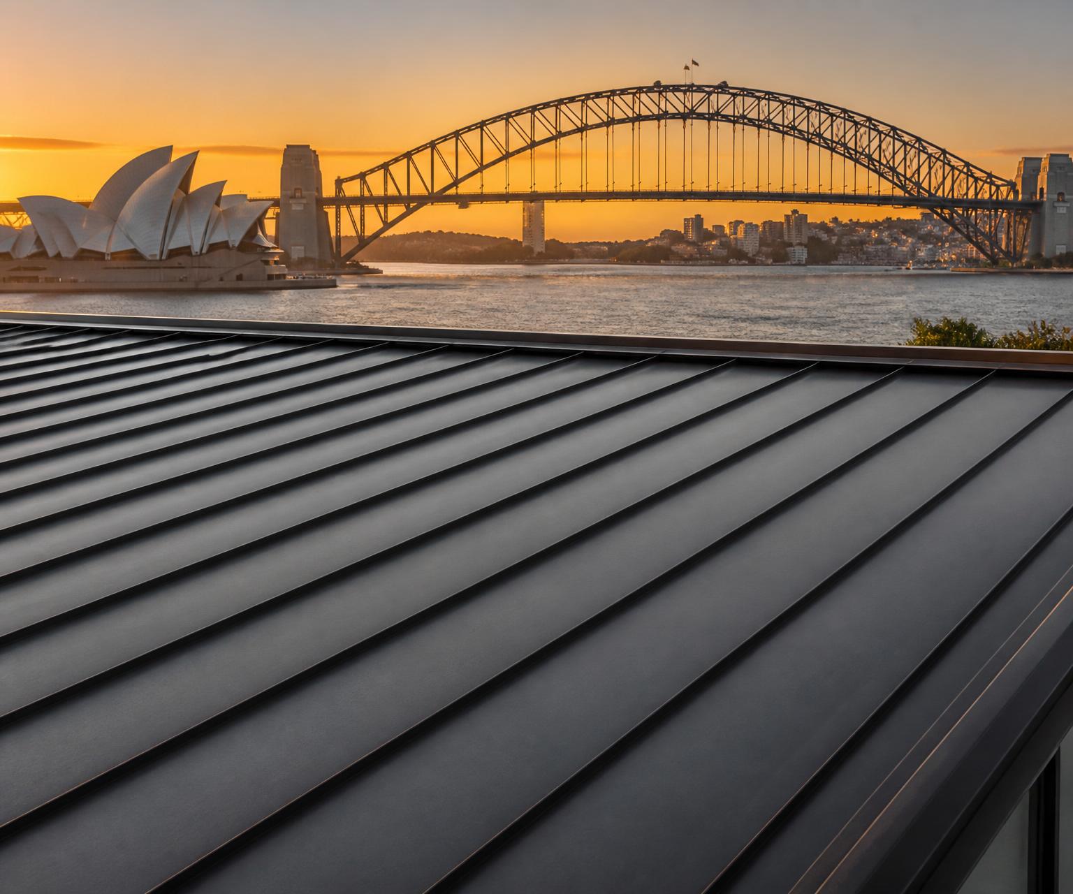 ONTRA roofer installing standing seam roof with Sydney Harbour Bridge in the background